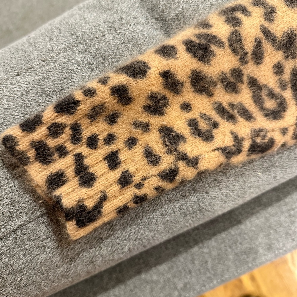 Angora leaopard print very good condition sweater no blemishes or tears.